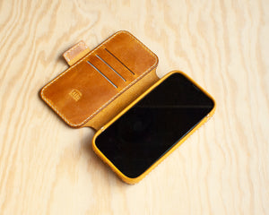 Honey leather iPhone wallet folio showing interior card pockets