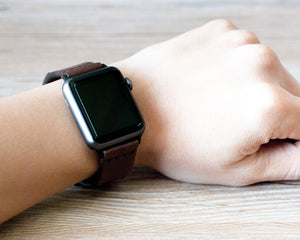 Ravenweave Walnut leather Apple Watch band, studio close-up