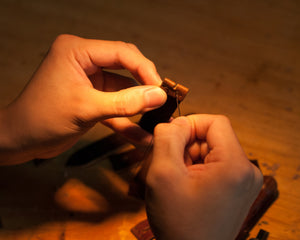Ravenweave leather craft, hand-stitched studio close-up