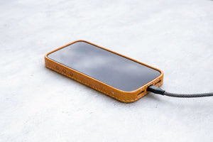 Honey oil-waxed leather iPhone case by Ravenweave, studio detail