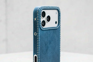 Ravenweave Cobalt leather iPhone case, lifestyle photo