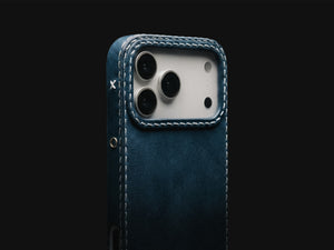 Cobalt oil-waxed leather iPhone case by Ravenweave, zoomed MagSafe detail